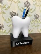 Customisable tooth pen holder