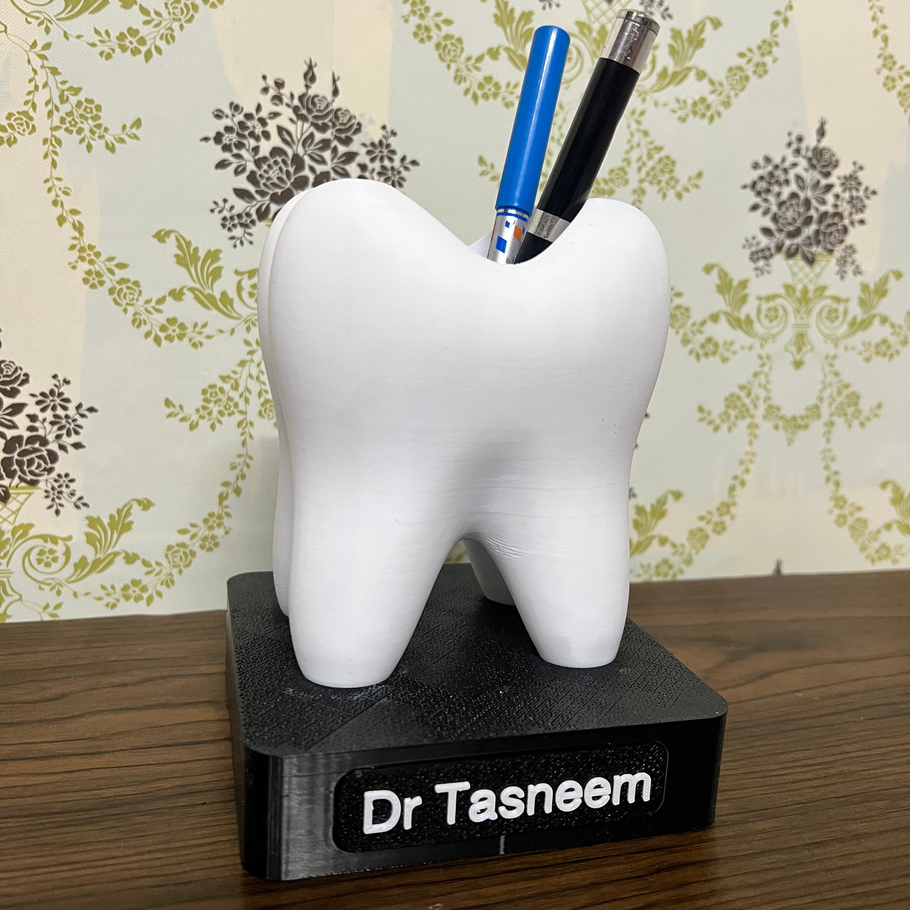 Customisable tooth pen holder