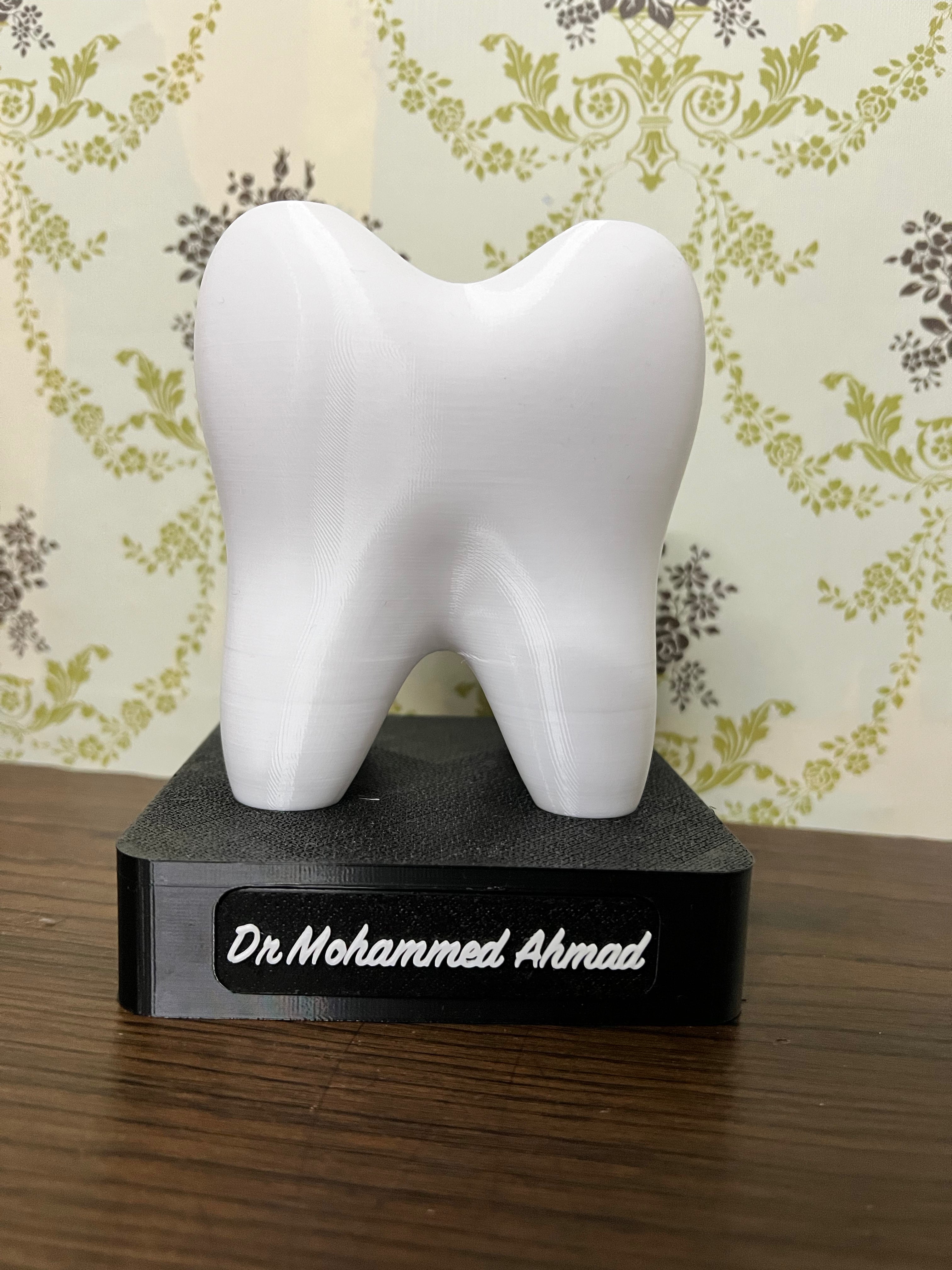 Customisable tooth pen holder